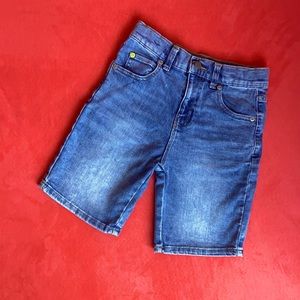 Size 8 boys blue acid wash jean shorts.